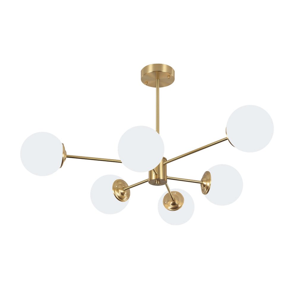 This 6-Light Tired Brass Sputnik Chandelier makes a statement with its mid-century modern flair. Featuring milky opal glass shades and a brass metal finish, this chandelier is perfect for adding a touch of style and elegance to any home. Ideal for dining rooms and kitchens, this light fixture is sure to add a touch of sophistication to any space.