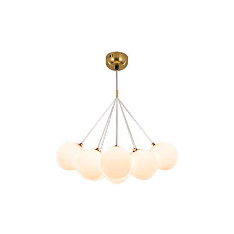 Dazzle any room in your home with this 13-Light Cluster Cloud Chandelier with Milk Globe Shade! Hand-blown Opal Glass globes, G9 bulbs, and a cluster globe design create a unique, elegant cloud shape with soft ambient light perfect for a nursery room or kid's room lighting decor. Add style and sophistication to any space with this enchanting chandelier!