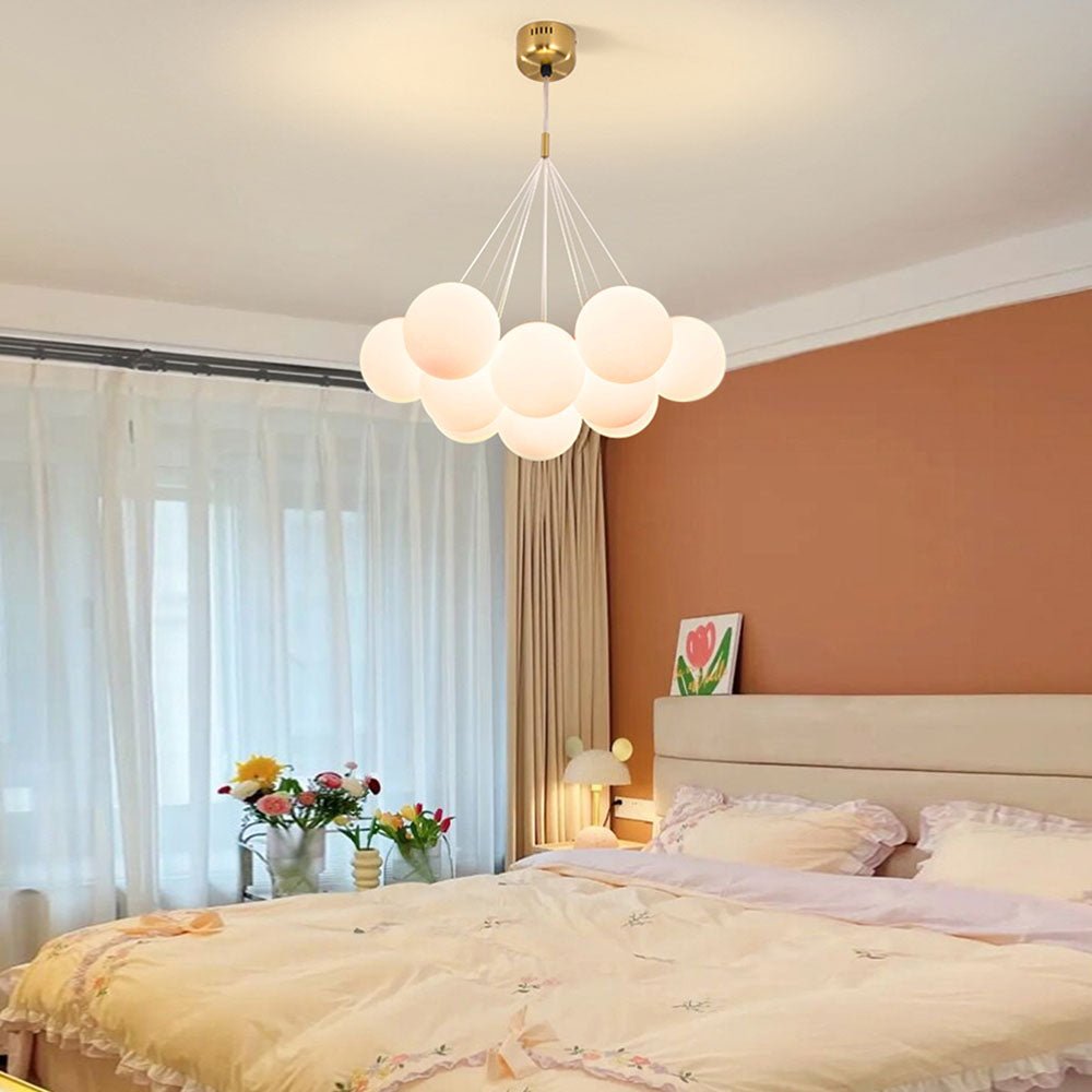 Dazzle any room in your home with this 13-Light Cluster Cloud Chandelier with Milk Globe Shade! Hand-blown Opal Glass globes, G9 bulbs, and a cluster globe design create a unique, elegant cloud shape with soft ambient light perfect for a nursery room or kid's room lighting decor. Add style and sophistication to any space with this enchanting chandelier!