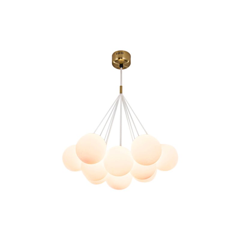 Dazzle any room in your home with this 13-Light Cluster Cloud Chandelier with Milk Globe Shade! Hand-blown Opal Glass globes, G9 bulbs, and a cluster globe design create a unique, elegant cloud shape with soft ambient light perfect for a nursery room or kid's room lighting decor. Add style and sophistication to any space with this enchanting chandelier!