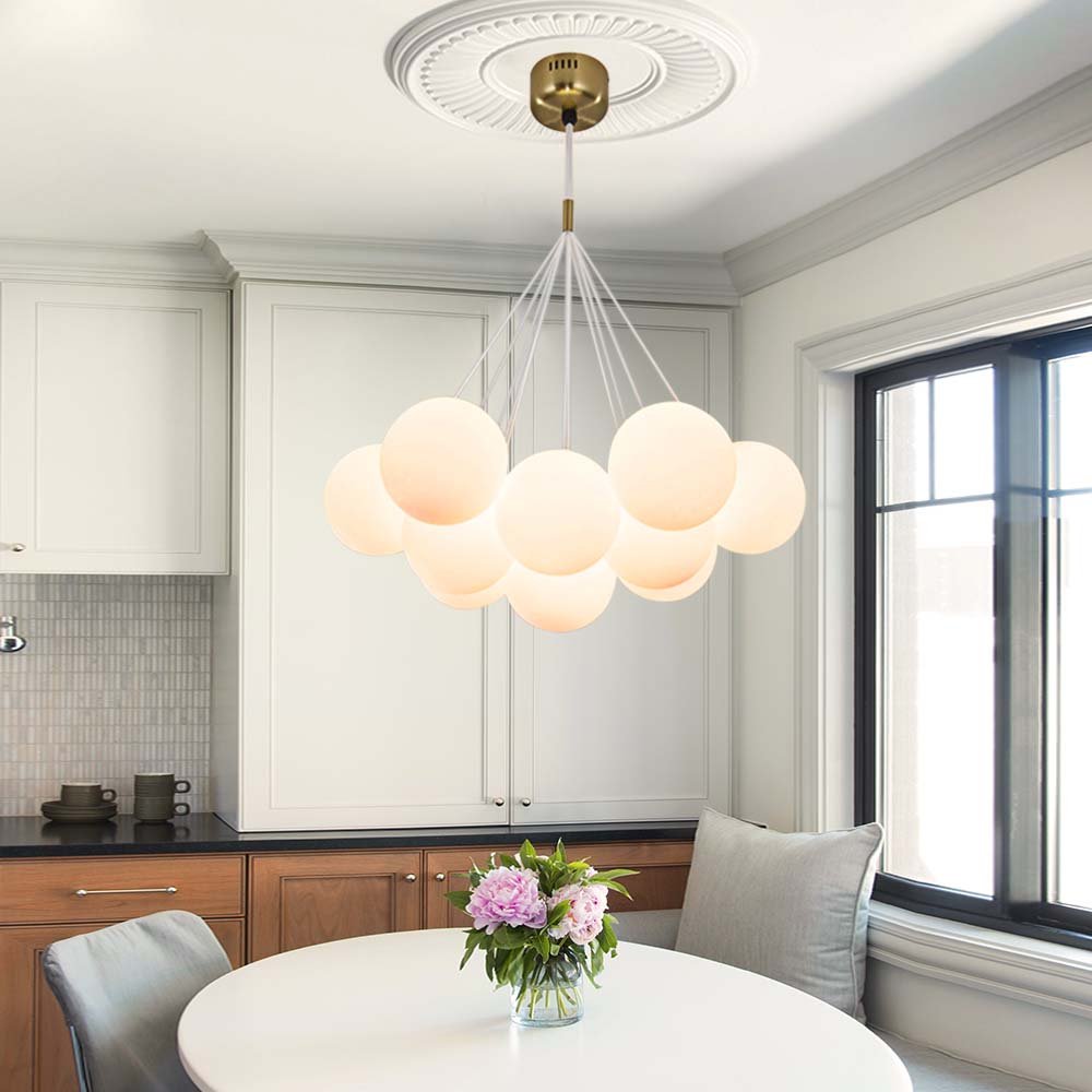 Dazzle any room in your home with this 13-Light Cluster Cloud Chandelier with Milk Globe Shade! Hand-blown Opal Glass globes, G9 bulbs, and a cluster globe design create a unique, elegant cloud shape with soft ambient light perfect for a nursery room or kid's room lighting decor. Add style and sophistication to any space with this enchanting chandelier!