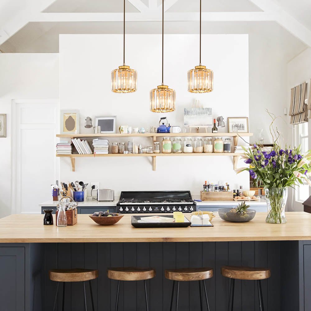 Light up any room with this stunning 3-Light Linear Pendant Light! Featuring three high-quality cylinder crystal shades for maximum sparkle, this is the perfect addition to your dining room, kitchen island area, or any other space. With a 39.4" wire, you can customize the hanging design to fit your unique style! Transform your home with this beautiful shining piece.