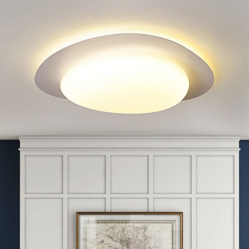 This sleek and modern 46W LED Cobblestone Flush Mount Ceiling Light will add a minimalist touch to any room. With an adjustable color temperature from 3000K to 6000K, it emits soft light to create a cozy atmosphere. Perfect for bedrooms, kid's rooms, and nurseries.