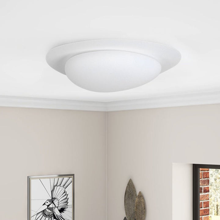 This sleek and modern 46W LED Cobblestone Flush Mount Ceiling Light will add a minimalist touch to any room. With an adjustable color temperature from 3000K to 6000K, it emits soft light to create a cozy atmosphere. Perfect for bedrooms, kid's rooms, and nurseries.