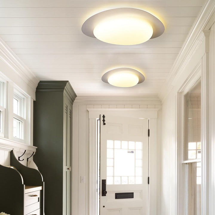 This sleek and modern 46W LED Cobblestone Flush Mount Ceiling Light will add a minimalist touch to any room. With an adjustable color temperature from 3000K to 6000K, it emits soft light to create a cozy atmosphere. Perfect for bedrooms, kid's rooms, and nurseries.