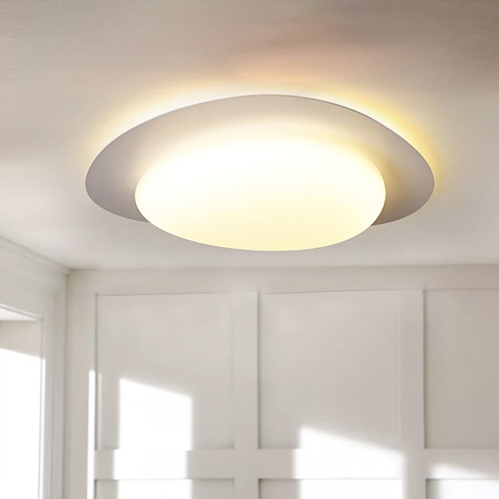 This sleek and modern 46W LED Cobblestone Flush Mount Ceiling Light will add a minimalist touch to any room. With an adjustable color temperature from 3000K to 6000K, it emits soft light to create a cozy atmosphere. Perfect for bedrooms, kid's rooms, and nurseries.