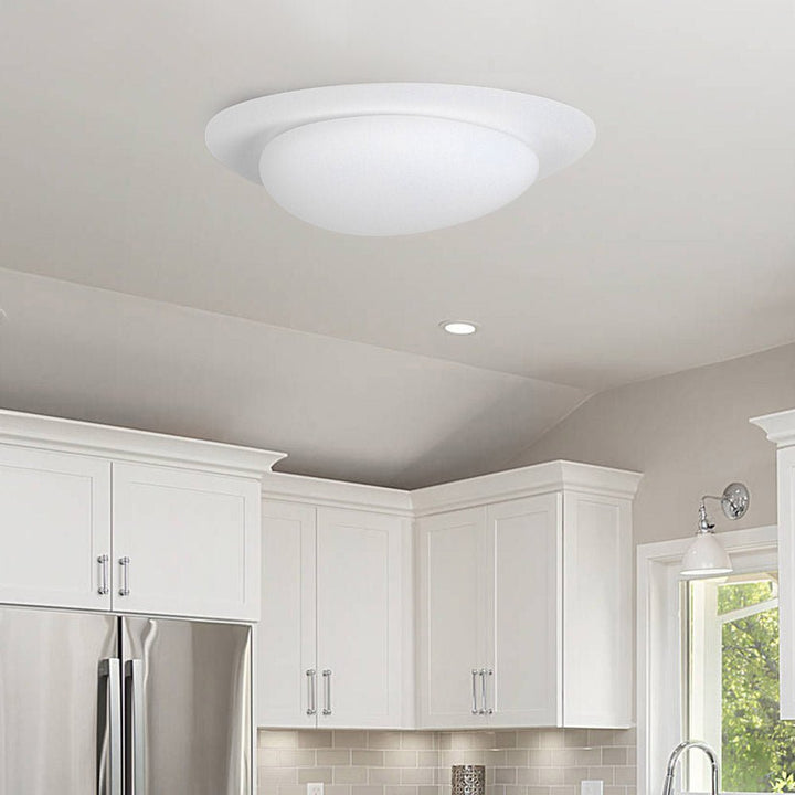 This sleek and modern 46W LED Cobblestone Flush Mount Ceiling Light will add a minimalist touch to any room. With an adjustable color temperature from 3000K to 6000K, it emits soft light to create a cozy atmosphere. Perfect for bedrooms, kid's rooms, and nurseries.