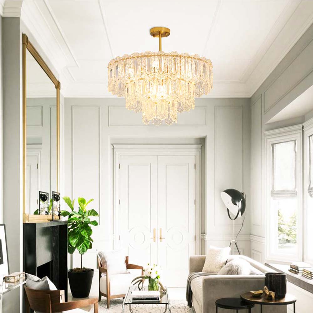 Bring light and shimmering elegance to any room with this modern tiered chandelier. Boasting 56 crystal glass panels and a warm brushed brass finish, this 9-light fixture is perfect for adding a luxurious look to any bedroom, living room, foyer, or entryway. Comes with two size rods for customizable hanging heights.