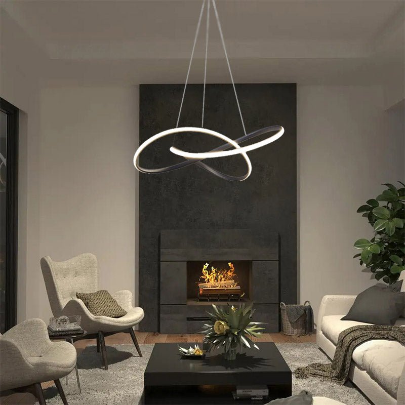 Let the timeless design of the Circular Knot Modern LED Chandelier 23.6 inches 50 Watt brighten your home. Crafted with modern clean lines and distinctive knot design, this eye-catching chandelier offers a sleek, chic look. Plus, its energy-efficient LED lighting and silicon white frosted diffuser ensure brilliant, warm illumination. Available in classic black and white finishes, it's a stylish addition to any living space.