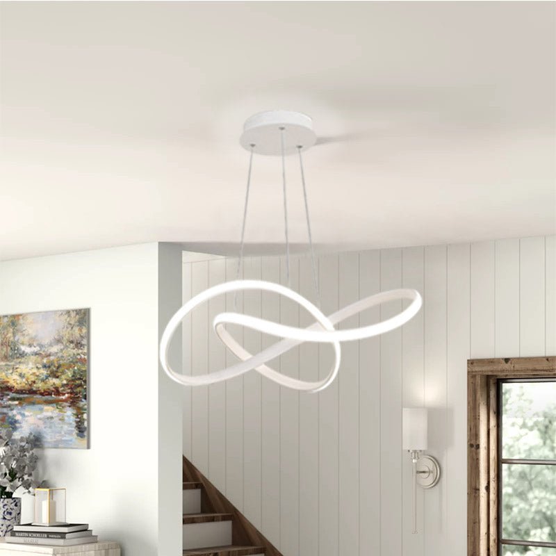 Let the timeless design of the Circular Knot Modern LED Chandelier 23.6 inches 50 Watt brighten your home. Crafted with modern clean lines and distinctive knot design, this eye-catching chandelier offers a sleek, chic look. Plus, its energy-efficient LED lighting and silicon white frosted diffuser ensure brilliant, warm illumination. Available in classic black and white finishes, it's a stylish addition to any living space.