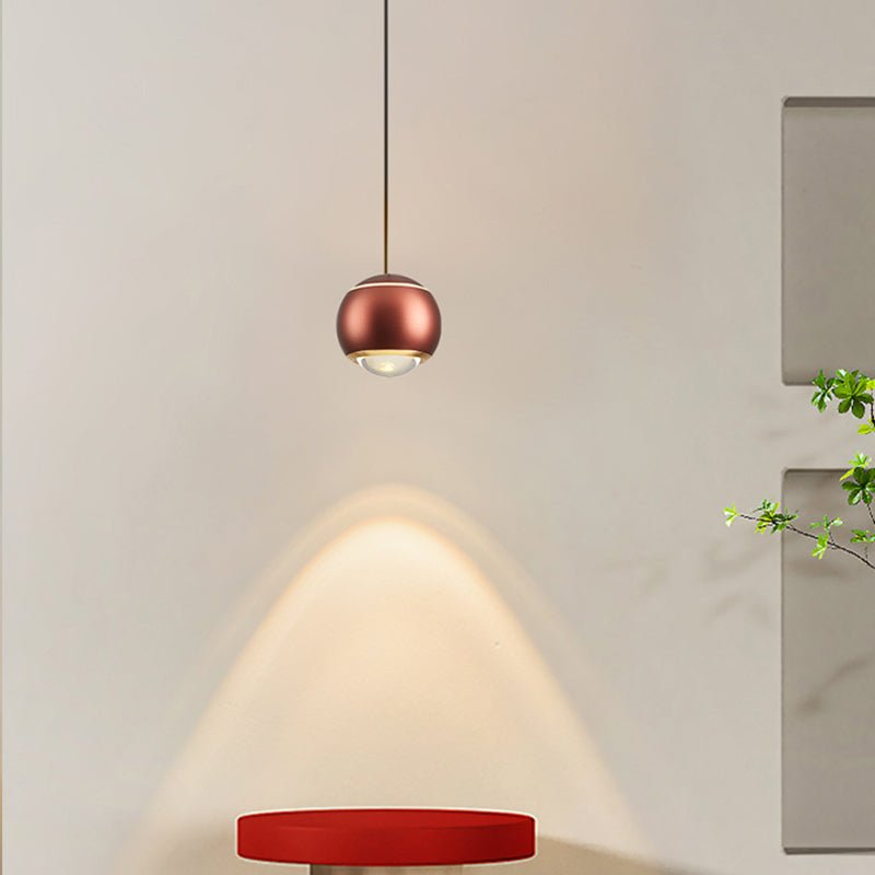 Update your living space with this contemporary 1-Light Mini Globe Spot Pendant Light! With an adjustable mini globe shape, spotlight, and auto lifting kit, this stylish pendant light provides task lighting in an array of modern colors, perfect for bedside and wall picture lighting. Experience convenience with an easy-to-use design!