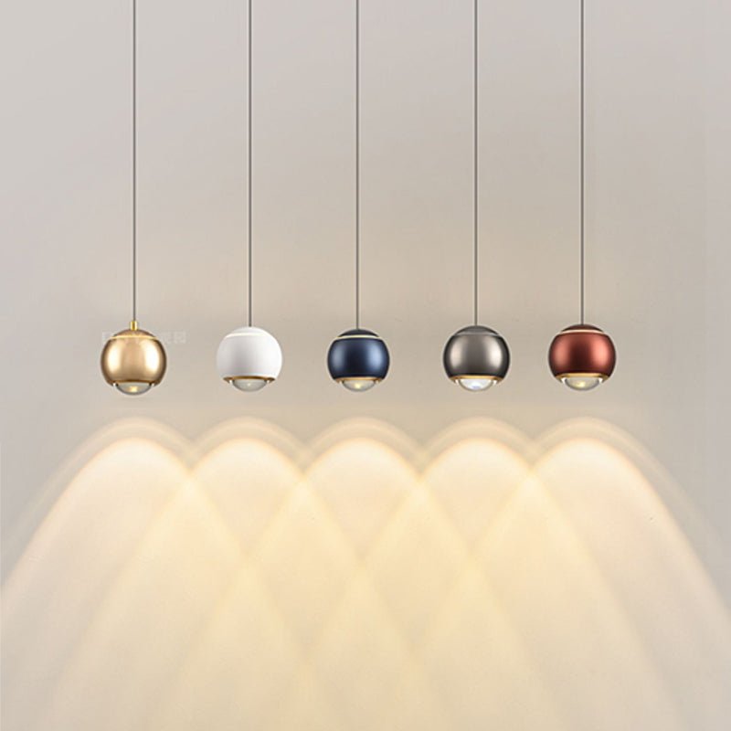 Update your living space with this contemporary 1-Light Mini Globe Spot Pendant Light! With an adjustable mini globe shape, spotlight, and auto lifting kit, this stylish pendant light provides task lighting in an array of modern colors, perfect for bedside and wall picture lighting. Experience convenience with an easy-to-use design!