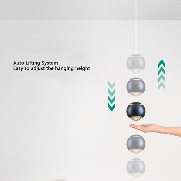 Update your living space with this contemporary 1-Light Mini Globe Spot Pendant Light! With an adjustable mini globe shape, spotlight, and auto lifting kit, this stylish pendant light provides task lighting in an array of modern colors, perfect for bedside and wall picture lighting. Experience convenience with an easy-to-use design!