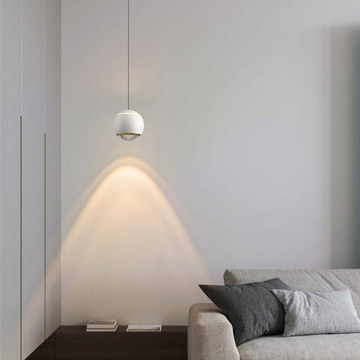 Update your living space with this contemporary 1-Light Mini Globe Spot Pendant Light! With an adjustable mini globe shape, spotlight, and auto lifting kit, this stylish pendant light provides task lighting in an array of modern colors, perfect for bedside and wall picture lighting. Experience convenience with an easy-to-use design!