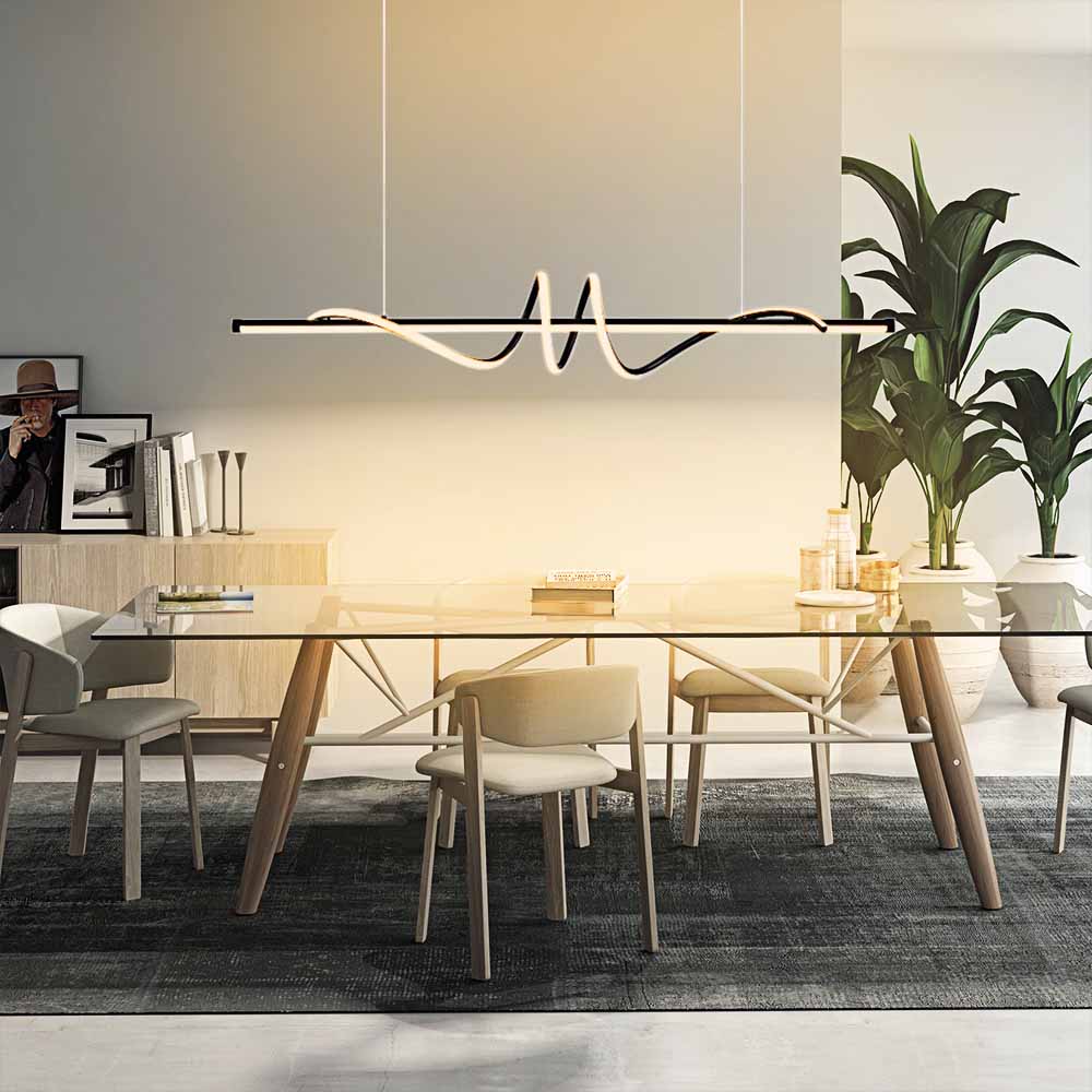 Make any space feel both modern and sophisticated with this Contemporary Dimmable Swirl Linear LED Chandelier Hanging Pendant! With its sleek linear design, integrated LED, and dimmable features with remote control, you can customize the color temperature from 3000K to 6000K, and brightness dimming from 10% to 100%, perfect for creating the perfect mood for your dining table or kitchen island. Transform your space with this stunning chandelier today!