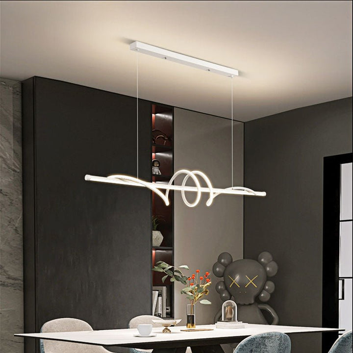 Make any space feel both modern and sophisticated with this Contemporary Dimmable Swirl Linear LED Chandelier Hanging Pendant! With its sleek linear design, integrated LED, and dimmable features with remote control, you can customize the color temperature from 3000K to 6000K, and brightness dimming from 10% to 100%, perfect for creating the perfect mood for your dining table or kitchen island. Transform your space with this stunning chandelier today!