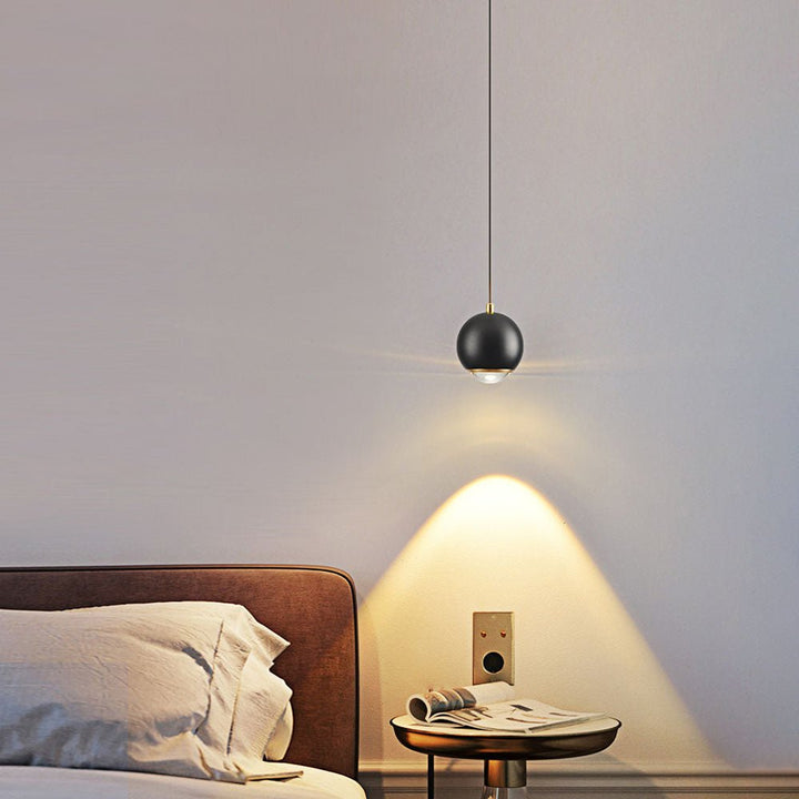 Add a modern touch to your living space with this Minimalist Single Light Sphere Mini Pendant Light Spot Light! The mini globe shape with spot light and auto-lifting kit on the canopy provide task lighting perfect for bedside or bathroom vanity. Experience adjustable, tailored illumination with effortless ease.