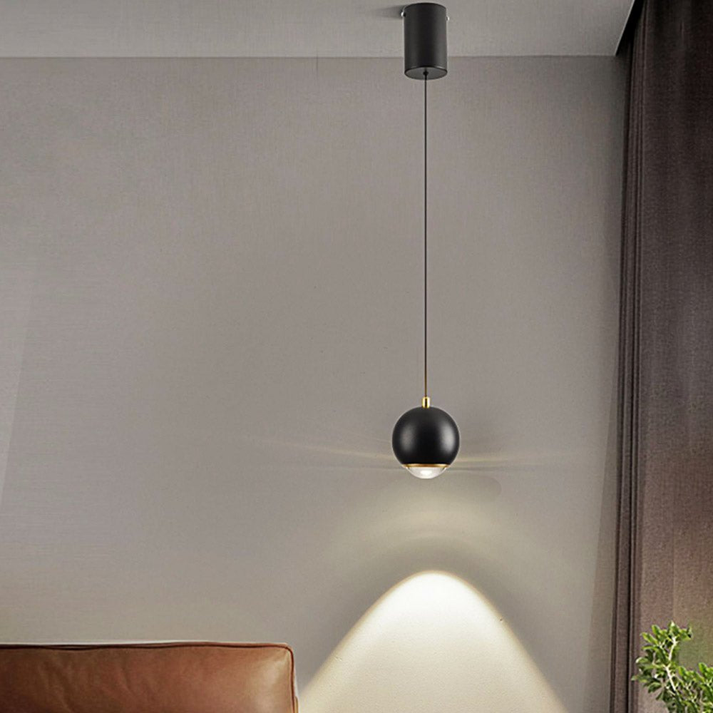 Add a modern touch to your living space with this Minimalist Single Light Sphere Mini Pendant Light Spot Light! The mini globe shape with spot light and auto-lifting kit on the canopy provide task lighting perfect for bedside or bathroom vanity. Experience adjustable, tailored illumination with effortless ease.