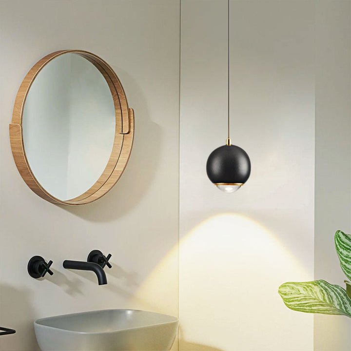 Add a modern touch to your living space with this Minimalist Single Light Sphere Mini Pendant Light Spot Light! The mini globe shape with spot light and auto-lifting kit on the canopy provide task lighting perfect for bedside or bathroom vanity. Experience adjustable, tailored illumination with effortless ease.