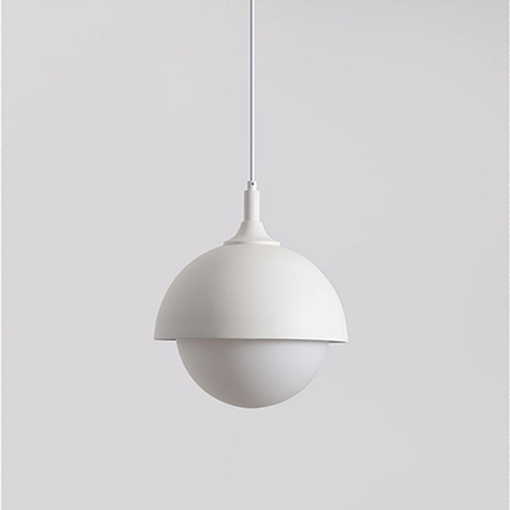 Light up any space with the Nordic Modern 1-Light Globe Pendant Light. This stylish metal dome pendant light features a dome shade holder and an opal glass diffuser, emitting a soft warm light perfect for any bedside, dining room, or kitchen island. With a modern black or modern white finish, this pendant light is sure to add a touch of modern elegance to your home.