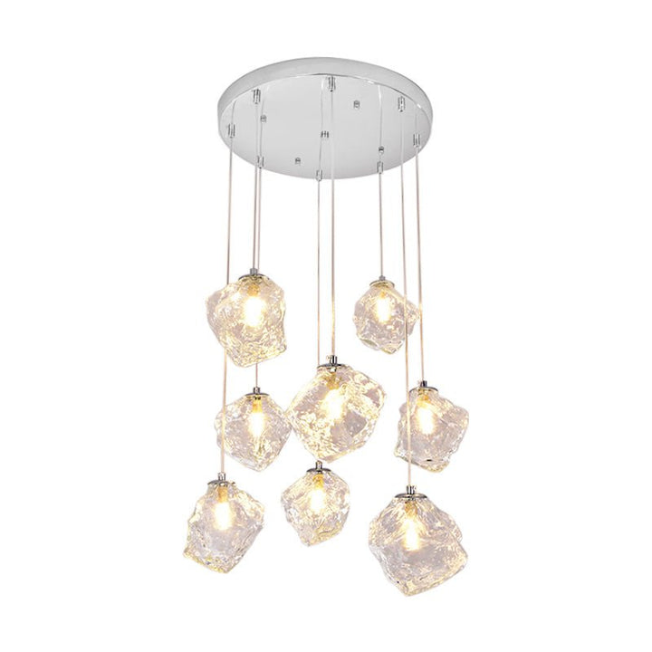 Light up your home with style: the Round Ice Glass Staircase Chandelier in Chrome. Its ice cube glass shade casts a warm, cozy atmosphere, perfect for creating a modern stylish welcoming ambience in the open staircase or entryway. Accentuate high ceilings or long staircases with this stunning chandelier, and watch as your home shines like never before!