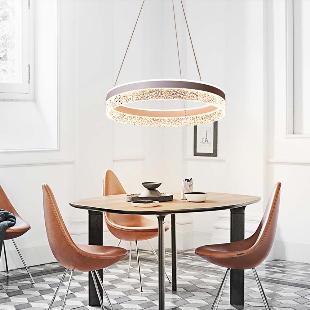 Make a statement with this modern 19.7" Wide LED Ring Chandelier. The diamond acrylic diffuser creates a stunning effect and the tunable white technology featuring 3 color modes will give your space the perfect ambiance. Choose between warm 3000K (soft white), clean crisp 4000K (bright white) or bright 6000K (daylight) -- all in one chandelier! Transform your home with this sleek, stylish chandelier in your choice of white, black, or gold finishes.